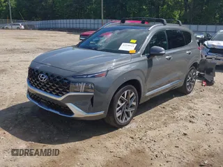 2023 Hyundai Santa Fe Calligraphy with VIN 5NMS54ALXPH633514, listed as a IAAI auction lot 42238114 with 12,969 mi miles and . Bid and sale history available at DreamBid. Image 2.