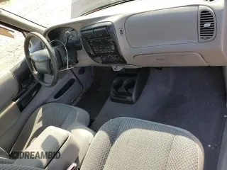 1999 Ford Ranger XL with VIN 1FTYR14V2XPA97269, listed as a Copart auction lot 52741825 with 142,302 mi miles and Salvage title. Bid and sale history available at DreamBid. Image 8.