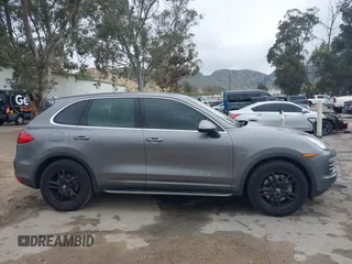2012 Porsche Cayenne S Hybrid with VIN WP1AE2A25CLA90636, listed as a IAAI auction lot 41922089 with 90,318 mi miles and . Bid and sale history available at DreamBid. Image 14.