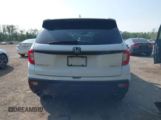 2019 Honda Passport EX-L with VIN 5FNYF8H56KB029748, listed as a IAAI auction lot 42405028 with 59,009 mi miles and . Bid and sale history available at DreamBid. Image 17.