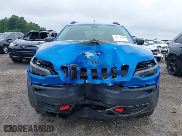 2019 Jeep Cherokee Trailhawk with VIN 1C4PJMBX0KD141577, listed as a IAAI auction lot 42413454 with 122,386 mi miles and . Bid and sale history available at DreamBid. Image 12.
