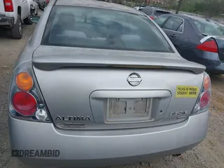 2002 Nissan Altima SE with VIN 1N4BL11D22C276694, listed as a IAAI auction lot 41949577 with 170,000 mi miles. Bid and sale history available at carsss.com. Image 16.