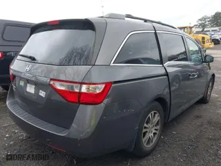 2012 Honda Odyssey EX-L with VIN 5FNRL5H61CB052408, listed as a IAAI auction lot 41864705 with 192,879 mi miles. Bid and sale history available at carsss.com. Image 4.