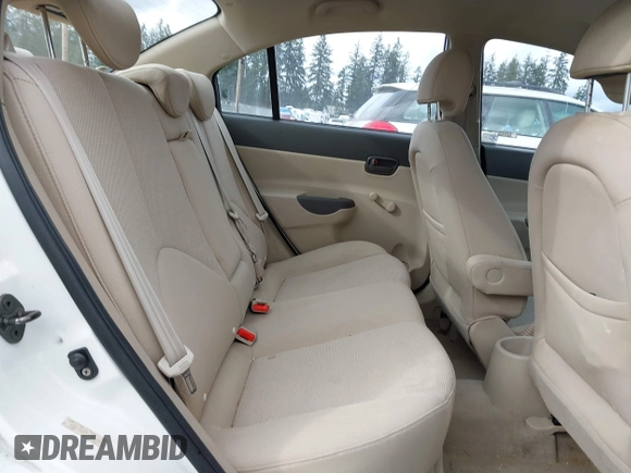 2007 Hyundai Accent GLS with VIN KMHCN46C67U097159, listed as a IAAI auction lot 41913373 with 103,303 mi miles. Bid and sale history available at carsss.com. Image 8.