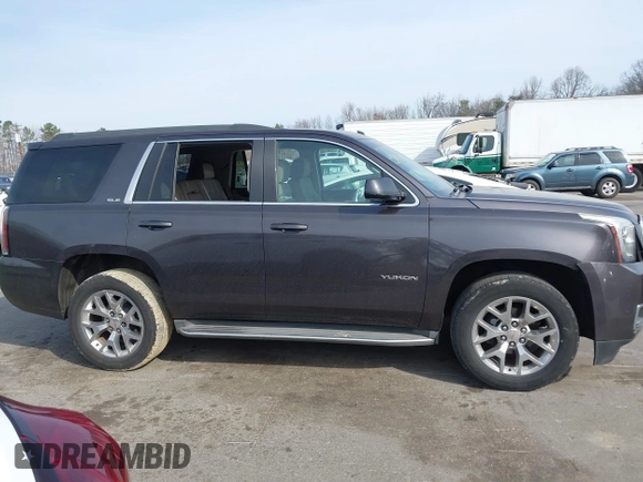 2015 GMC Yukon SLE with VIN 1GKS1AKCXFR269862, listed as a IAAI auction lot 41784763 with 156,286 mi miles. Bid and sale history available at carsss.com. Image 13.