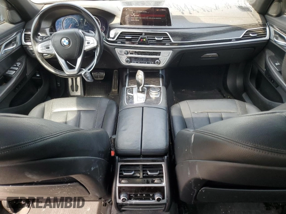 2019 BMW 7 Series 740i xDrive z VIN WBA7E4C56KGV71028, wystawiony jako Copart lot #76860474 z przebiegiem 66 657 mil mil oraz Nie do naprawy • Non repairable. Historia ofert i sprzedaży dostępna na DreamBid. Obrazek 8.