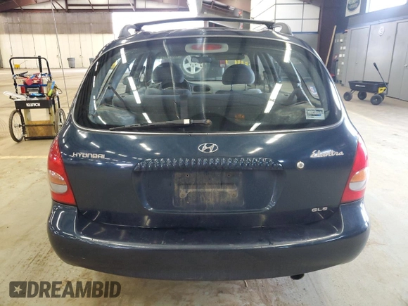 2000 Hyundai Elantra z VIN KMHJW35F5YU181324, wystawiony jako Copart lot #48016775 z przebiegiem 79 686 mil mil oraz Czysty tytuł • Clean title. Historia ofert i sprzedaży dostępna na DreamBid. Obrazek 6.
