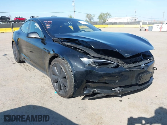2023 Tesla Model S with VIN 5YJSA1E54PF531021, listed as a IAAI auction lot 42014104 with Not provided miles and . Bid and sale history available at DreamBid. Image 1.