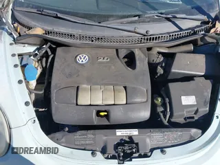 2004 Volkswagen Beetle with VIN 3VWCM21YX4M308827, listed as a IAAI auction lot 41703410 with 163,192 mi miles and . Bid and sale history available at DreamBid. Image 10.
