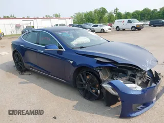 2017 Tesla Model S 100D with VIN 5YJSA1E27HF192505, listed as a IAAI auction lot 42409365 with 111,881 mi miles and . Bid and sale history available at DreamBid. Image 1.