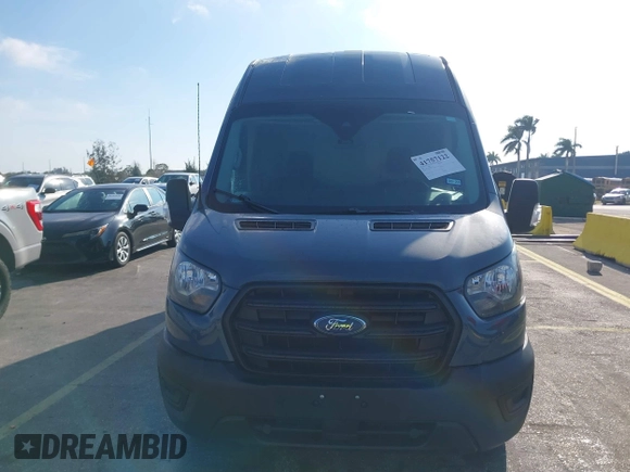 2020 Ford Transit Cargo with VIN 1FTBR3X85LKB04164, listed as a IAAI auction lot 41757122 with 101,038 mi miles. Bid and sale history available at carsss.com. Image 12.