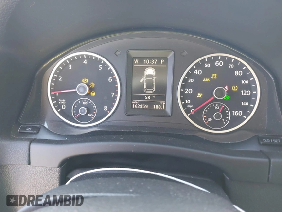 2012 Volkswagen Tiguan SEL with VIN WVGAV7AX2CW000962, listed as a IAAI auction lot 40815475 with 162,859 mi miles and . Bid and sale history available at DreamBid. Image 7.