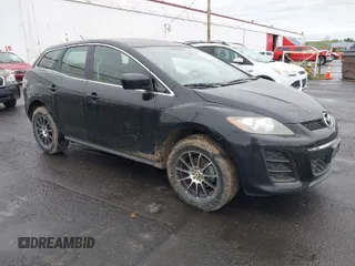 2010 Mazda CX-7 SV with VIN JM3ER2WM6A0335550, listed as a IAAI auction lot 41991095 with 154,700 mi miles. Bid and sale history available at carsss.com. Image 1.