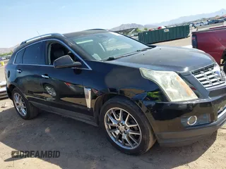 2014 Cadillac SRX Performance Collection with VIN 3GYFNCE35ES645978, listed as a IAAI auction lot 42458494 with 183,911 mi miles and . Bid and sale history available at DreamBid. Image 1.