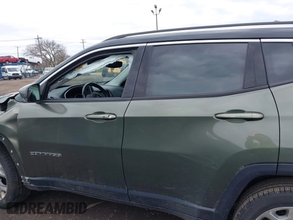 2020 Jeep Compass Limited with VIN 3C4NJDCBXLT123657, listed as a IAAI auction lot 42004527 with 99,669 mi miles and . Bid and sale history available at DreamBid. Image 14.