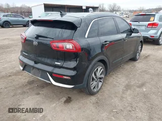 2017 Kia Niro Touring with VIN KNDCE3LC0H5040261, listed as a IAAI auction lot 41751900 with 100,194 mi miles. Bid and sale history available at carsss.com. Image 4.