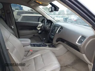 2012 Dodge Durango Crew with VIN 1C4SDHDT0CC321037, listed as a IAAI auction lot 42793232 with 162,593 mi miles and . Bid and sale history available at DreamBid. Image 5.