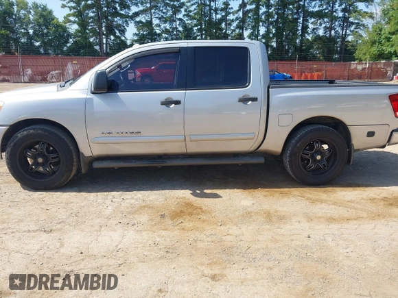 2012 Nissan Titan SV with VIN 1N6BA0ED8CN320723, listed as a IAAI auction lot 42642482 with 214,941 mi miles and . Bid and sale history available at DreamBid. Image 14.