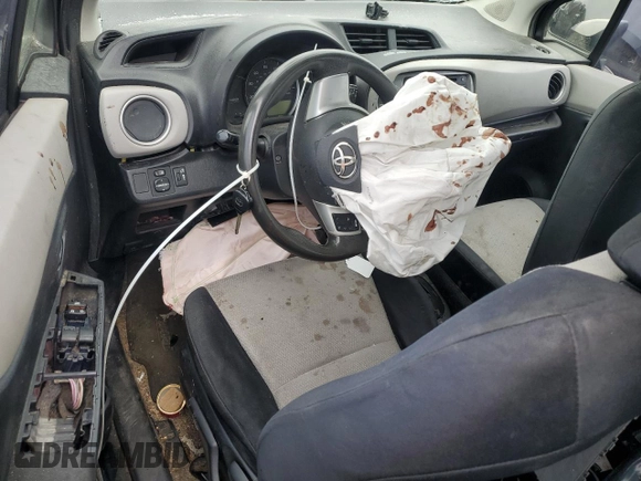 2012 Toyota Yaris L z VIN JTDJTUD3XCD520162, wystawiony jako Copart lot #54741275 z przebiegiem Nie podano mil oraz Szkoda całkowita • Salvage title. Historia ofert i sprzedaży dostępna na DreamBid. Obrazek 8.