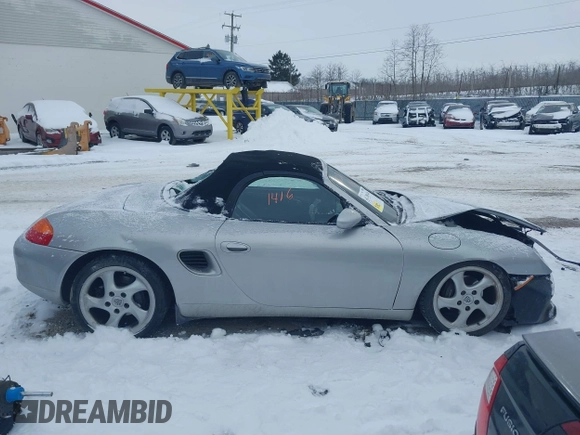2000 Porsche Boxster z VIN WP0CA2984YU621650, wystawiony jako IAAI lot #41381416 z przebiegiem 71 514 mil mil oraz . Historia ofert i sprzedaży dostępna na DreamBid. Obrazek 13.