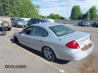 2000 Ford Taurus SES with VIN 1FAFP55U1YA246677, listed as a IAAI auction lot 42626261 with 228,669 mi miles and . Bid and sale history available at DreamBid. Image 3.