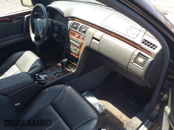 1997 Mercedes-Benz E-Class with VIN WDBJF72F8VA309745, listed as a IAAI auction lot 42119469 with 131,318 mi miles. Bid and sale history available at carsss.com. Image 5.