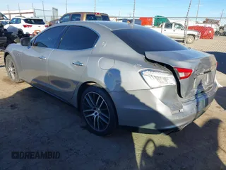2015 Maserati Ghibli z VIN ZAM57XSA7F1135961, wystawiony jako IAAI lot #40831583 z przebiegiem 89 671 mil mil oraz . Historia ofert i sprzedaży dostępna na DreamBid. Obrazek 3.