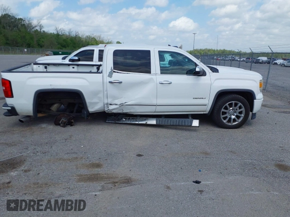 2014 GMC Sierra 1500 Denali z VIN 3GTP1WEC3EG421005, wystawiony jako IAAI lot #41936295 z przebiegiem 188 918 mil mil oraz . Historia ofert i sprzedaży dostępna na DreamBid. Obrazek 13.