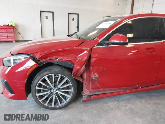 2021 BMW 2 Series 228i xDrive with VIN WBA73AK07M7J08053, listed as a IAAI auction lot 42357914 with 59,537 mi miles and . Bid and sale history available at DreamBid. Image 6.