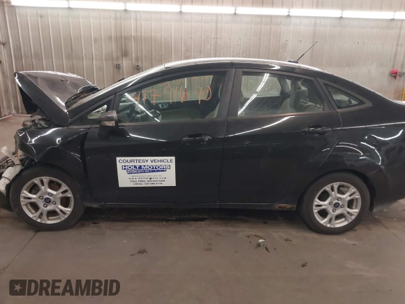 2014 Ford Fiesta SE with VIN 3FADP4BJ9EM212156, listed as a IAAI auction lot 41791690 with 92,760 mi miles and . Bid and sale history available at DreamBid. Image 15.