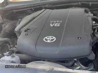 2014 Toyota Tacoma with VIN 5TFLU4ENXEX089541, listed as a IAAI auction lot 42989505 with 142,040 mi miles and . Bid and sale history available at DreamBid. Image 13.
