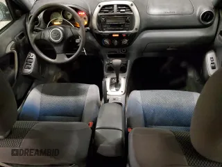 2003 Toyota RAV4 z VIN JTEHH20V836080549, wystawiony jako Copart lot #57141275 z przebiegiem 169 110 mil mil oraz Szkoda całkowita • Salvage title. Historia ofert i sprzedaży dostępna na DreamBid. Obrazek 8.