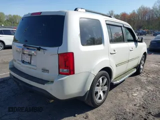 2013 Honda Pilot Touring with VIN 5FNYF4H97DB069979, listed as a IAAI auction lot 42133922 with 276,574 mi miles and . Bid and sale history available at carsss.com. Image 4.