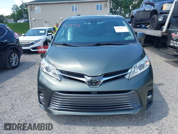 2018 Toyota Sienna XLE with VIN 5TDDZ3DC4JS189540, listed as a IAAI auction lot 42594973 with 103,374 mi miles and . Bid and sale history available at DreamBid. Image 12.