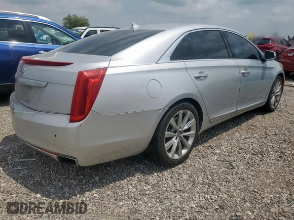 2013 Cadillac XTS Luxury с VIN 2G61P5S30D9122912, выставлен на аукционе Copart как лот 56970895 с пробегом 189 310 миль миль и Списание • Salvage title. История ставок и продаж доступна на DreamBid. Изображение 3.