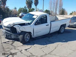 2014 Chevrolet Silverado 1500 Work Truck with VIN 1GCNCPEH8EZ314647, listed as a IAAI auction lot 41432985 with 138,022 mi miles. Bid and sale history available at carsss.com. Image 2.