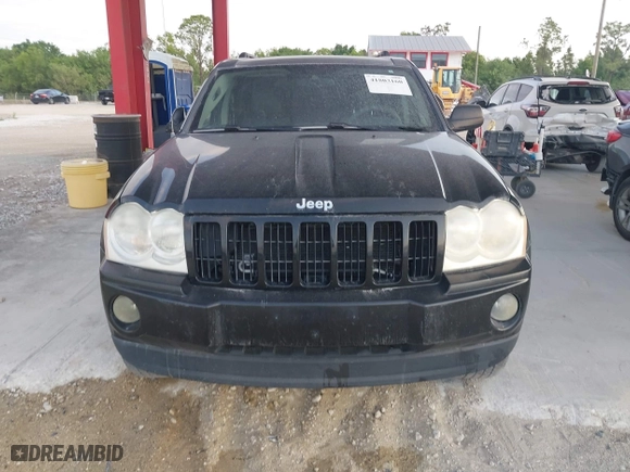 2005 Jeep Grand Cherokee Laredo with VIN 1J4HR48N75C647740, listed as a IAAI auction lot 41803160 with 145,147 mi miles. Bid and sale history available at carsss.com. Image 12.