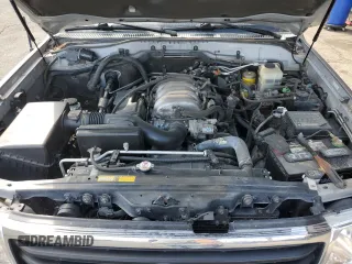 2002 Toyota Land Cruiser z VIN JTEHT05J522027452, wystawiony jako Copart lot #51141595 z przebiegiem 278 465 mil mil oraz Szkoda całkowita • Salvage title. Historia ofert i sprzedaży dostępna na DreamBid. Obrazek 12.
