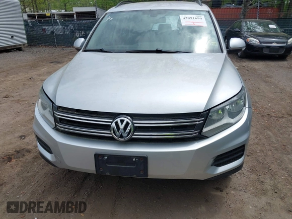 2016 Volkswagen Tiguan S with VIN WVGBV7AX1GW523335, listed as a IAAI auction lot 42091690 with 165,495 mi miles and . Bid and sale history available at DreamBid. Image 6.