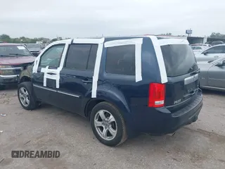 2012 Honda Pilot EX-L with VIN 5FNYF4H52CB070811, listed as a IAAI auction lot 41938672 with 156,446 mi miles and . Bid and sale history available at DreamBid. Image 3.