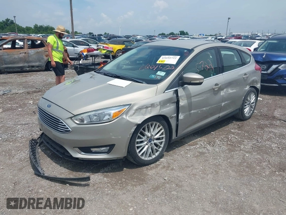 2015 Ford Focus Titanium с VIN 1FADP3N2XFL367753, выставлен на аукционе IAAI как лот 42695722 с пробегом 26 565 миль миль и . История ставок и продаж доступна на DreamBid. Изображение 6.
