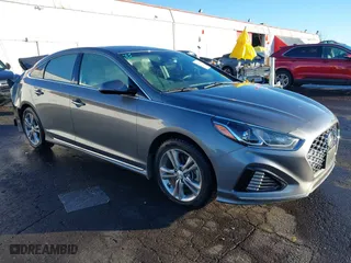 2019 Hyundai Sonata Sport with VIN 5NPE34AFXKH800205, listed as a IAAI auction lot 41227546 with 82,850 mi miles. Bid and sale history available at carsss.com. Image 1.