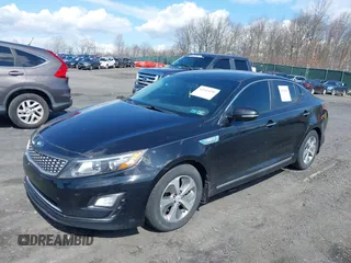 2016 Kia Optima Hybrid with VIN KNAGM4AD8G5092898, listed as a IAAI auction lot 42045490 with 148,673 mi miles. Bid and sale history available at carsss.com. Image 2.