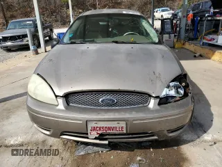 2004 Ford Taurus SES with VIN 1FAFP55UX4A170435, listed as a Copart auction lot 46819055 with 334,774 mi miles and Salvage Title. Bid and sale history available at DreamBid. Image 5.