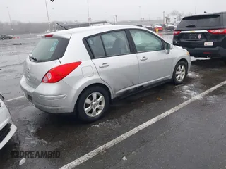 2009 Nissan Versa 1.8 SL with VIN 3N1BC13E59L420840, listed as a IAAI auction lot 41503232 with 129,824 mi miles. Bid and sale history available at carsss.com. Image 4.