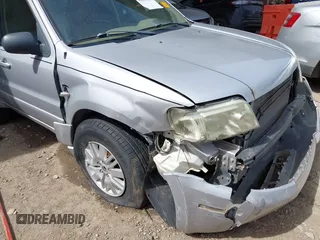 2006 Mercury Mariner Convenience with VIN 4M2YU56Z86KJ12563, listed as a IAAI auction lot 41817401 with 152,156 mi miles and . Bid and sale history available at DreamBid. Image 6.
