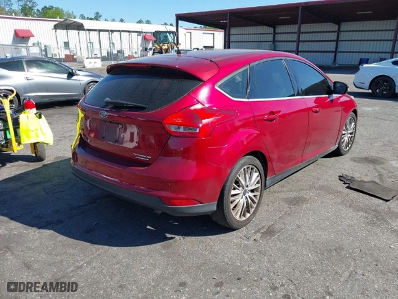 2015 Ford Focus Titanium with VIN 1FADP3N28FL215499, listed as a IAAI auction lot 41839092 with 152,102 mi miles. Bid and sale history available at carsss.com. Image 4.