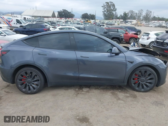 2023 Tesla Model Y Performance z VIN 7SAYGDEF1PF925274, wystawiony jako IAAI lot #42078813 z przebiegiem 20 422 mil mil oraz . Historia ofert i sprzedaży dostępna na DreamBid. Obrazek 12.