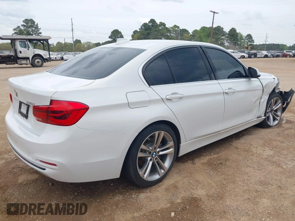 2018 BMW 3 Series 330i with VIN WBA8B9C59JEE82660, listed as a IAAI auction lot 41899267 with 65,205 mi miles and . Bid and sale history available at DreamBid. Image 4.
