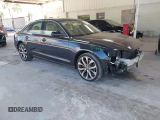 2014 Audi A6 Premium Plus z VIN WAUGFAFC1EN005090, wystawiony jako IAAI lot #42137480 z przebiegiem 85 920 mil mil oraz . Historia ofert i sprzedaży dostępna na DreamBid. Obrazek 1.